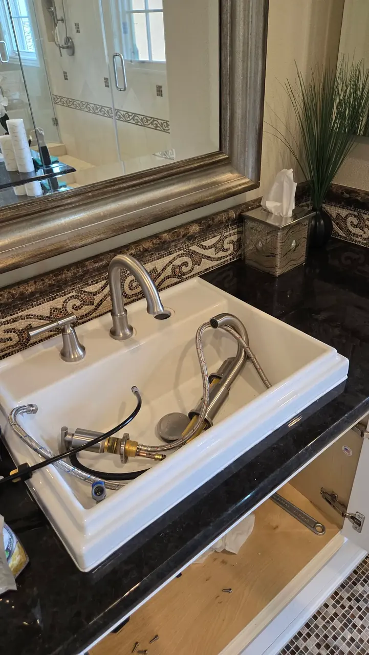 Bathroom faucet installation on a vanity in San Diego